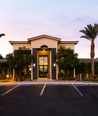 South Blvd exterior leasing office at twilight